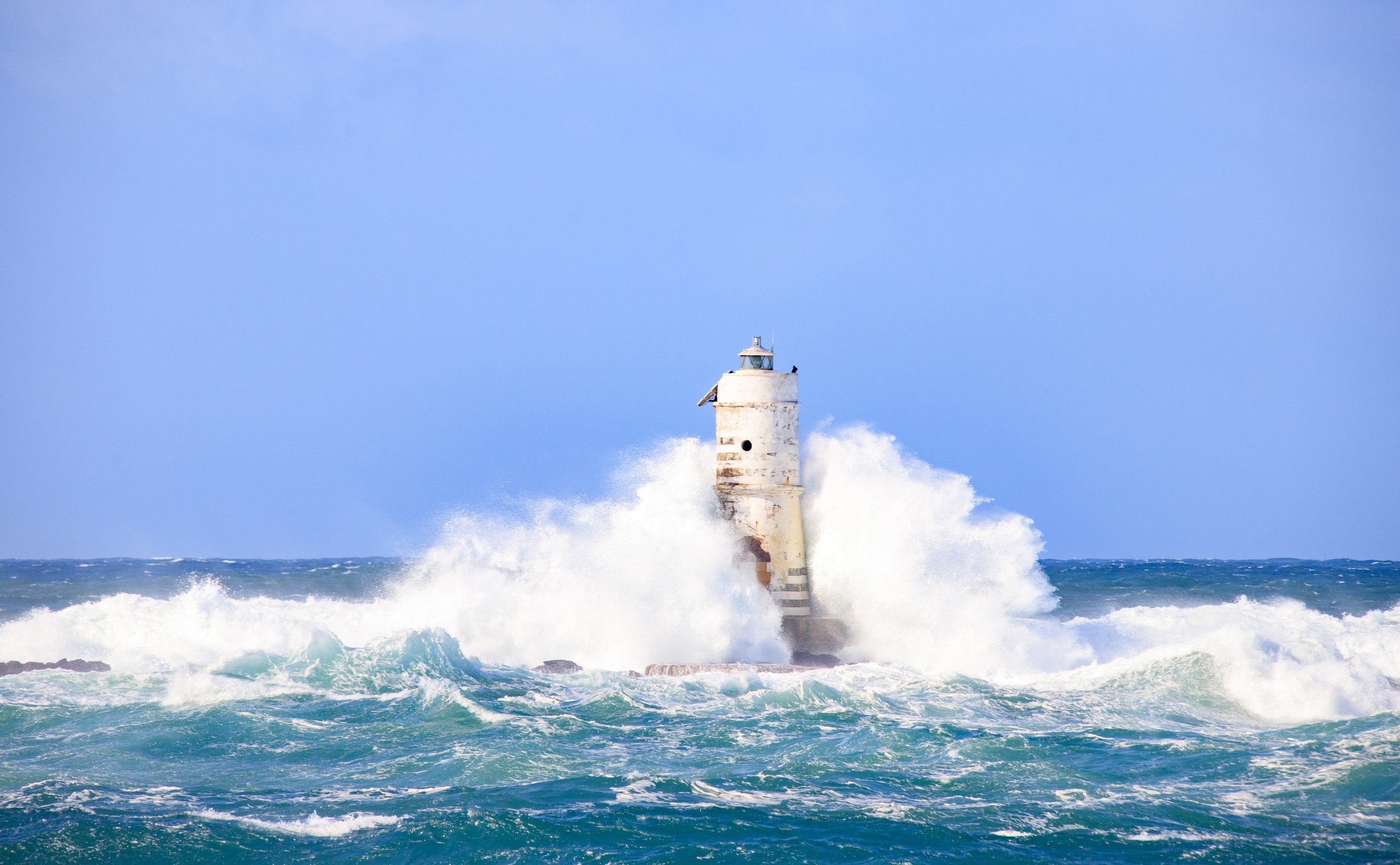 Lighthouse sea waves rain storm